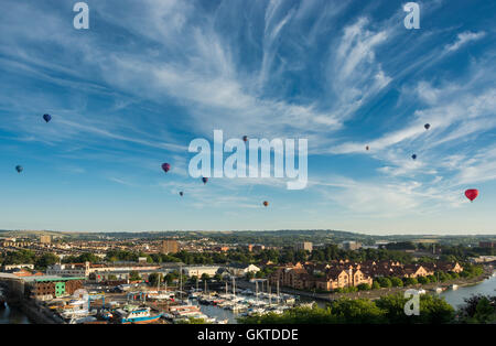 View over the Harbourside area, Bristol during an evening mass ascent from the 38th annual Bristol International Balloon Fiesta Stock Photo