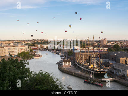 View over the Harbourside area, Bristol during an evening mass ascent from the 38th annual Bristol International Balloon Fiesta Stock Photo