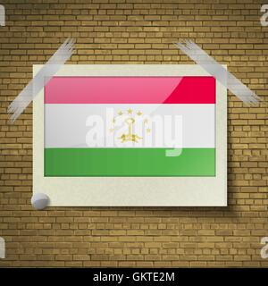 Flags Tajikistanat frame on a brick background. Vector Stock Vector