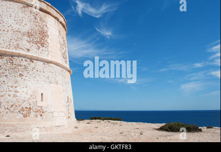 Formentera, Balearic Islands: view of the Torre de sa Punta Prima, a 17th century watchtower on the east coast of the island Stock Photo