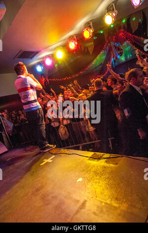 Singer, singwriter, rapper, producer and actor, Example, Elliot John Gleave, performing at Oceana, a club in Brighton. Stock Photo