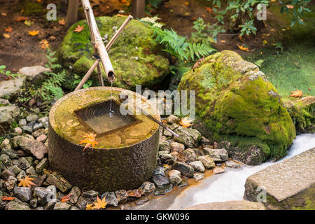 Traditional basin for hand washing in Kyoto, Japan. Stock Photo