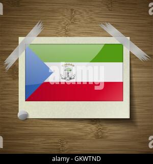 Flags Equatorial Guinea at frame on wooden texture. Vector Stock Vector