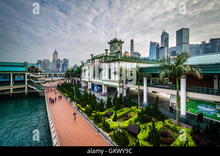 View of a waterfront promenade along the Victoria Harbour, in Hong Kong, Hong Kong. Stock Photo