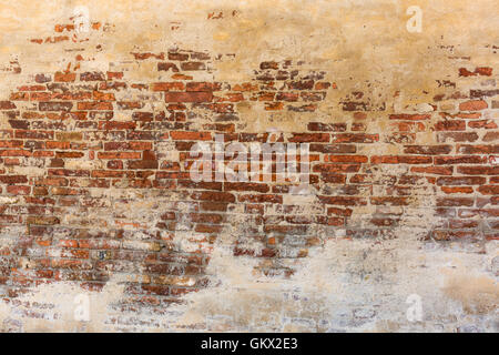 decorative background texture from cracked brick wall Stock Photo