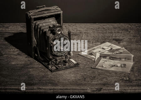 Vintage Camera with some old Photos of the Austro-Hungarian First World War soldiers Stock Photo