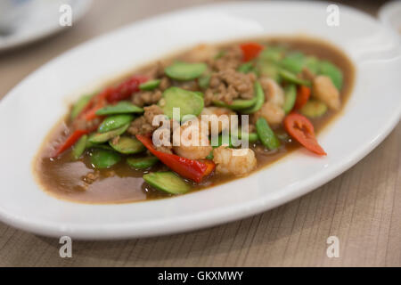 minced pork stir fry with parkia and chili - Thai food Stock Photo