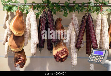 Moenchengladbach, Germany. 22nd Aug, 2016. Meat products hang at the meat counter in a branch of real,- SB-Warenhaus before the start of a press appointment on the topic 'Job market factor trade: training and entry qualifications' in Moenchengladbach, Germany, 22 August 2016. oto: Henning Kaiser/dpa/Alamy Live News Stock Photo