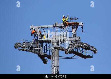 El Alto, Bolivia, 23rd August 2016. A technician checks a drone that is being used to carry a light synthetic cable between the pylons of a new cable car / gondola lift that is under construction. This is the first part of the process to install the final steel cable that will carry the gondolas. This cable car between Rio Seco and La Ceja in El Alto is one of a second phase of cable car lines that are part of an ambitious project to relieve traffic congestion. 3 routes from the first phase are already operating between the cities of La Paz and El Alto. Credit:  James Brunker / Ģ����ý Live News Stock Photo