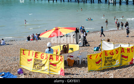 Brighton, UK. 24th Aug, 2016. Crowds flock to Brighton beach to enjoy the hot sunshine today with temperatures forecast to reach over thirty degrees centigrade as the heatwave weather continues throughout southern Britain Credit:  Simon Dack/Alamy Live News Stock Photo