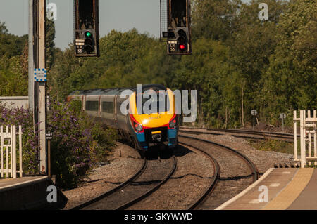 National Express East Midlands Trains  Diesel express train  Kettering station  colour light signals electrification needed Stock Photo