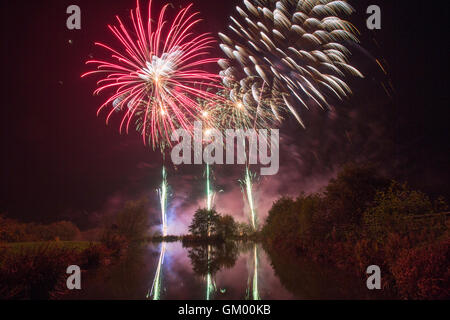 Spectacular and colourful firework display set against a dark Autumn sky in Lancashire, celebrating Guy Fawkes Night Stock Photo