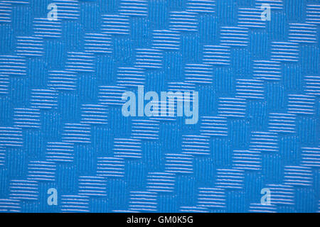 Repetitive pattern in blue plastic Stock Photo