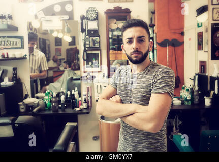 Traditional ritual of shaving the beard in a old style barber shop. Stock Photo