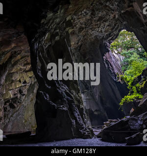 'The Cathedral', is a 40-foot (12 m) high main chamber in an old slate mine in the little langdale valley. It is lit by two wind Stock Photo