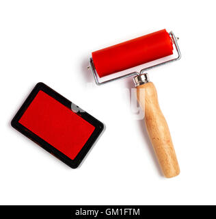 red ink stamp and roller isolated on a white background Stock Photo