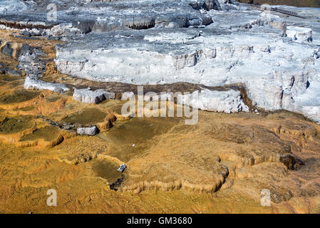 View of travertine terraces at Mammoth Hot Springs in Yellowstone National Park Stock Photo