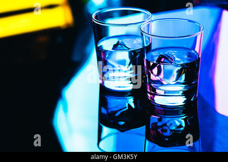 drinking glasses close-up on a dark background. Stock Photo