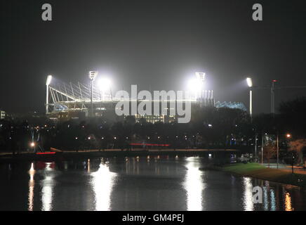 Melbourne Cricket Ground light reflects in Yarra river in Melbourne Australia. Stock Photo