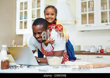 Family in the kitchen Stock Photo