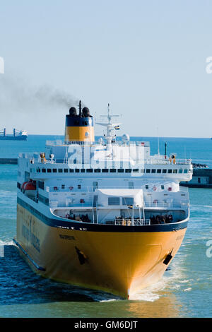 Ferry Mega Express 5 from Sardinia and Corsica entering harbour at Livorno, Italy Stock Photo