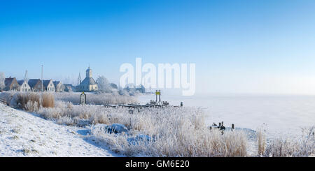 The beautiful village of Durgerdam in The Netherlands along the Markermeer (Lake Marken). Photographed in the morning after one Stock Photo