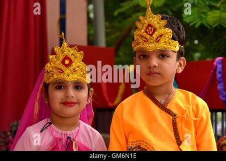 India. 24th Aug, 2016. First step school children dressed as Lord Krishna and Radha to take part in a religious procession on the occasion of Janamashtami in India. Credit:  Shaukat Ahmed/Pacific Press/Alamy Live News Stock Photo