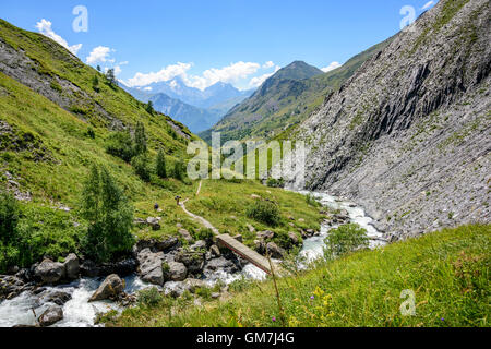 People trekking in the Valley Ferrand, Oisans, France, Europe. Stock Photo