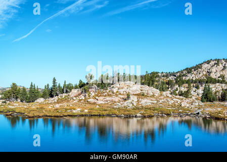 Lake and reflection in Shoshone National Forest in Wyoming, USA Stock Photo