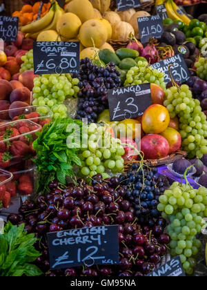 Various fresh fruits on display on a stall at Borough Market in London, UK Stock Photo