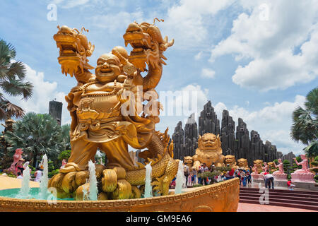 Ho Chi Minh city ( Saigon ), Vietnam - September 02, 2015: Fountain with dragon and buddha statues in Suoi Tien amusement park.