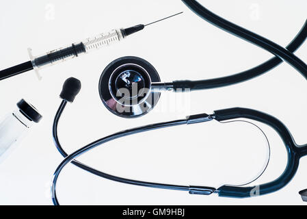 Stethoscope, syringe and test tube on white background Stock Photo - Alamy