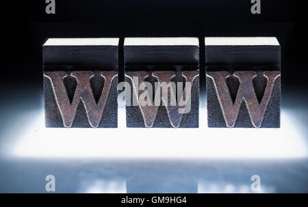 Word 'WWW' carved in blocks Stock Photo
