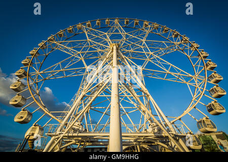 Ferris wheel at the Mall of Asia, in Pasay, Metro Manila, The Philippines. Stock Photo