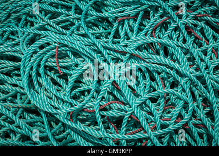 A closeup of a pile of green rope in Bonavista, Newfoundland and Labrador, Canada. Stock Photo