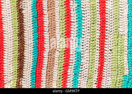 Colorful striped abstract pattern of knitted rug, background photo texture Stock Photo