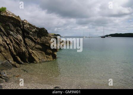 Rocky shore, Helford River, Cornwall, England Stock Photo