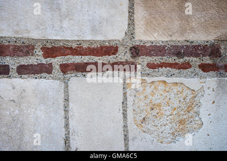 Fragment of an old brick and stone wall. Saint Sernin Basilica, Toulouse, France. Stock Photo