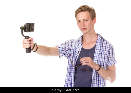 Man holds mobile phone on gimbal. Isolated on white. Stock Photo