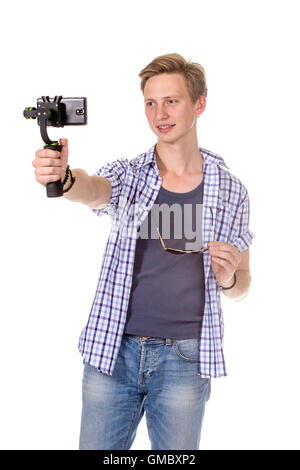 Man holds mobile phone on gimbal. Isolated on white. Stock Photo
