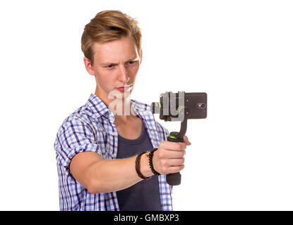 Man holds mobile phone on gimbal. Isolated on white. Stock Photo