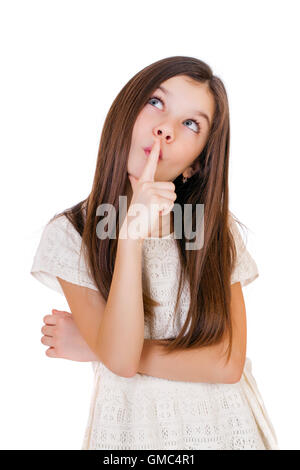 Cute girl deep in thought looking away, isolated on white background Stock Photo