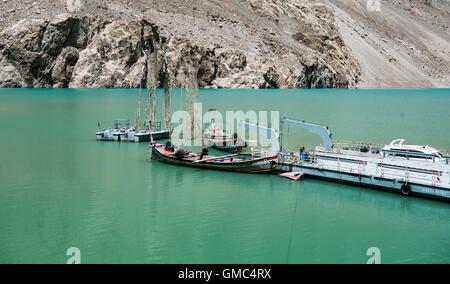 Abandoned ferry boats and pontoons on Attabad lake in the Gojal valley, Hunza, Gilgit-Baltistan, Pakistan Stock Photo