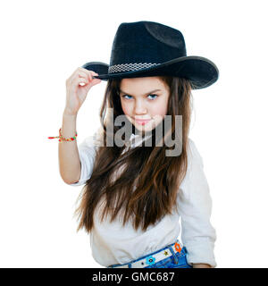 Portrait of a beautiful little girl in a black cowboy hat, studio on white isolated background Stock Photo