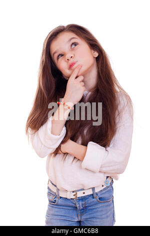 Cute girl deep in thought looking away, isolated on white background Stock Photo