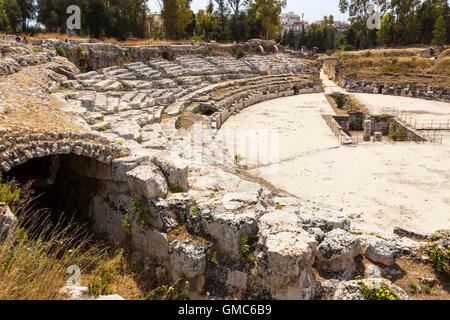 The Roman Amphitheatre, Neapolis Archaeological Park, Syracuse, Sicily, Italy Stock Photo