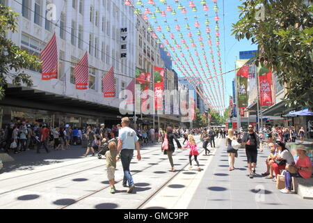 People shop for X'mas on Burke Street in Melbourne Australia. Stock Photo