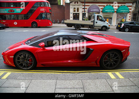 Knightsbridge, London, UK, 25 Aug 2016 - Lamborghini with UAEAD licence plate parked on double yellow lines in Knightsbridge Credit:  Dinendra Haria/Alamy Live News Stock Photo