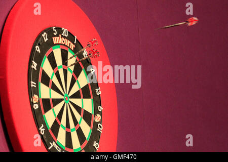 Perth, Australia. 26th August, 2016. Perth Convention and Exhibition Centre, Perth, Australia. TABtouch Perth Darts Masters. Darts fly towards the board. Credit:  Action Plus Sports Images/Alamy Live News Stock Photo