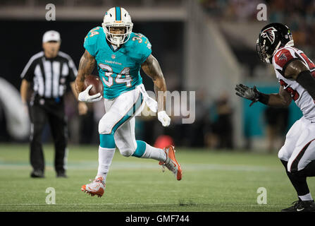 Miami Dolphins running back Arian Foster does drills, Tuesday, Aug. 16 ...